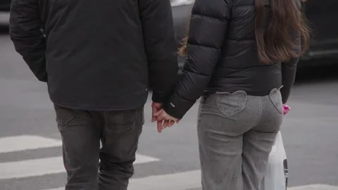 Couple walking hand in hand Stock Footage 315141358
