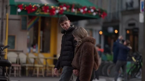Couple walking hand-in-hand in Paris France Romantic young couple strolling Stock Footage 325263161
