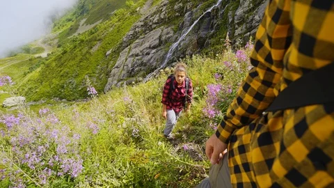 Couple walking in mountain Stock Footage 124042016