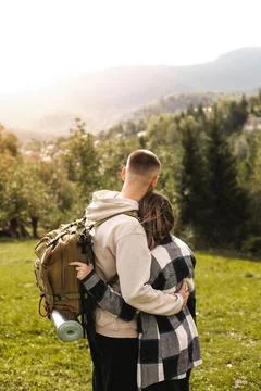 Couple walking in mountain forest Stock Photos