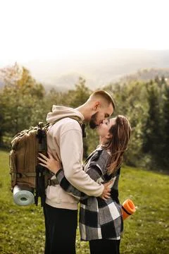 Couple walking in mountain forest Stock Photos