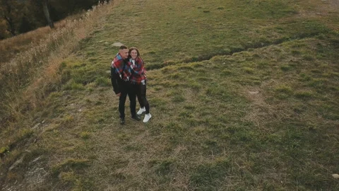 Couple walking in the mountains Stock Footage 129591314
