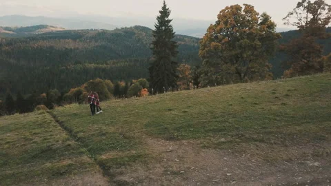 Couple walking in the mountains Stock Footage 130074754