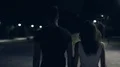 The couple walking in the night park. slow motion 4k or 4k+ Resolution