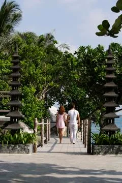 Couple walking on path Stock Photos