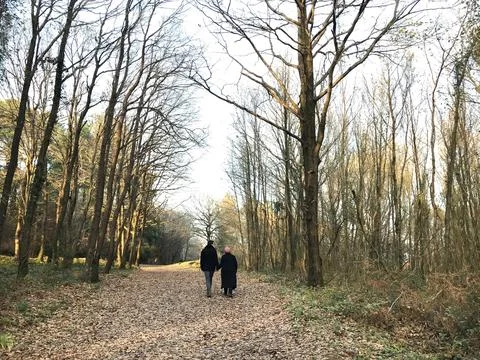 Couple walking pathway Stock Photos