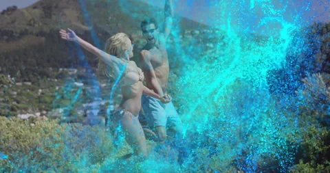 Couple walking pool edge starting glowing blue particle vortex, demonstrating Stock Footage 314473369