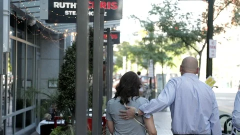 Couple walking in Public Stock Footage 100034184
