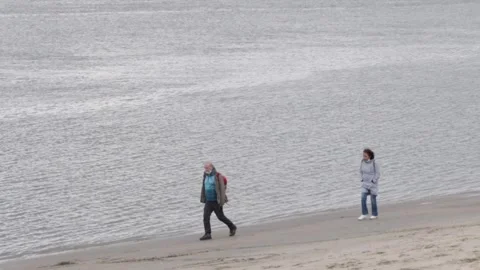 Couple walking at the riverside Stock Footage 138838204