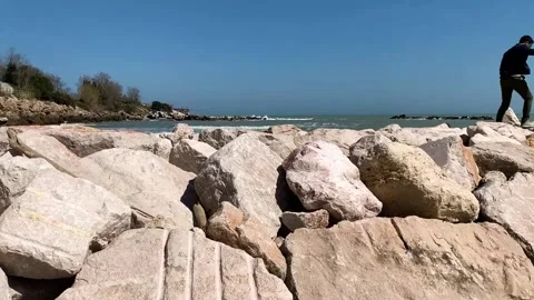 Couple walking on rocks Stock Footage 157755556
