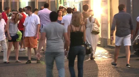 Couple walking on sidewalk. Stock Footage 12034908