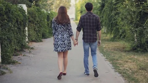 Couple walking on the street Stock Footage 70397524