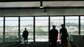 Couple walking with suitcase along overpass inside station, interstate traveling HD Footage