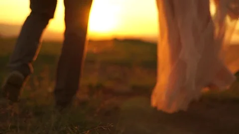 Couple walking on sunrise background Stock Footage 73240012