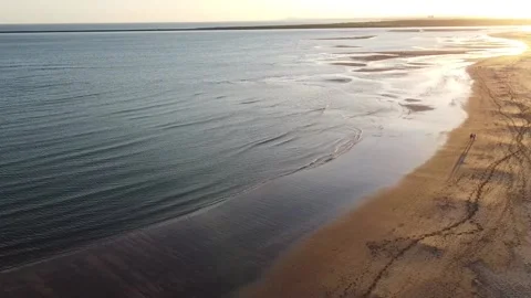Couple walking on sunset at the beach Video stock 194437654