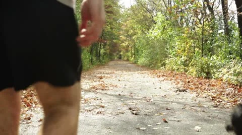 Couple walking their dog on trail. Stock Footage 8916396