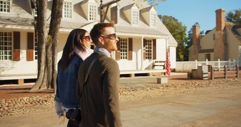 Couple Walking Through Beautiful Colonial Williamsburg in Fall Stock Footage 120927059