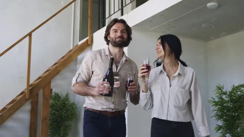 Couple Walking Through New Flat with Champagne and Glasses Stock-Footage 311853670