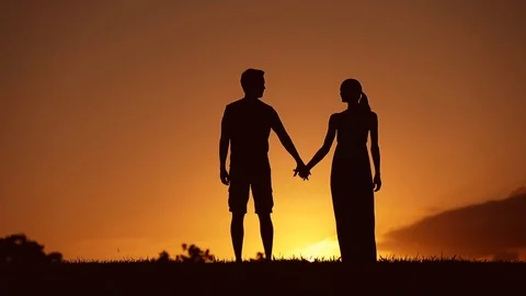 Couple walking together at sunset Vídeo Stock 119003822