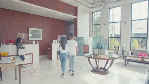 Couple Walking Toward The Lobby Stock Footage 162108122