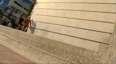 Couple walking in town Stock Footage 43691595