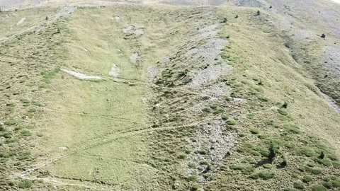 Couple walking in the valley of the pyrenees Stock Footage 145421340