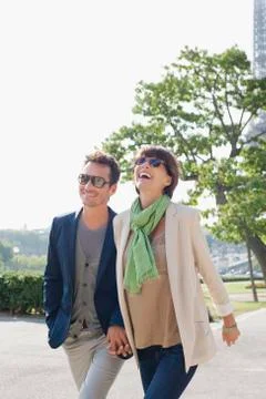 Couple walking on a walkway, Eiffel Tower, Paris, Ile-de-France, France Fotos Stock