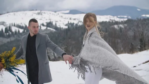 Couple walking in the winter forest Stock Footage 147685570