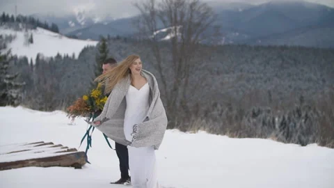 Couple walking in the winter forest Stock Footage 147730828