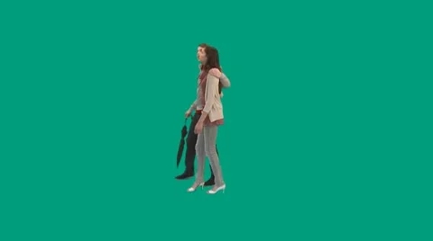Couple walks into rain and opens umbrella - green screen - pre keyed - MINT.GS Stock-Footage 8569933