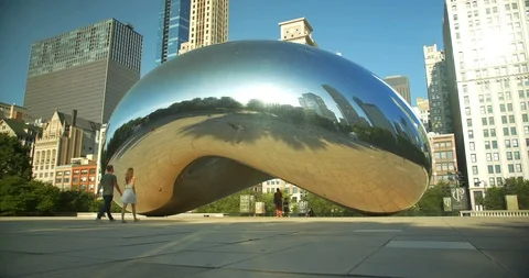Couple Walks Towards Cloud Gate, Chicago Stock Footage 98880277