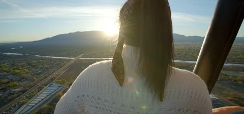 Couple Watching Sunset From Flying Hot Air Balloon Stock Footage 109490992