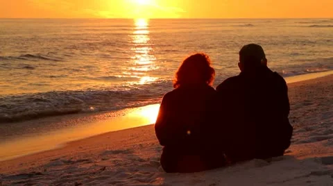 Couple Watching Sunset Stock Footage 10721201