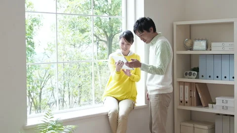 Couple Watching a Tablet PC Stock Footage 332772960