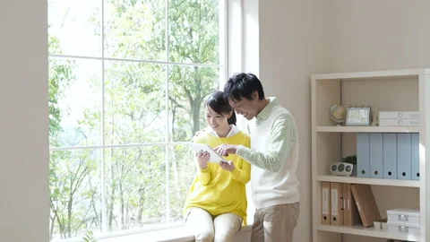 Couple Watching a Tablet PC Stock Footage 332772973