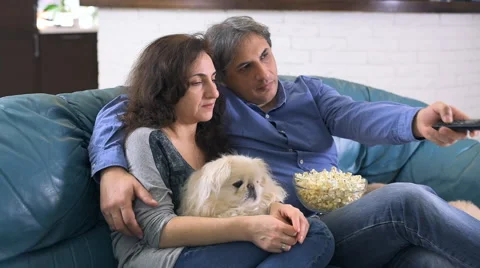 Couple watching TV Stock Footage 60624390