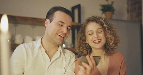 Couple watching video on a date Stock Footage 114121266