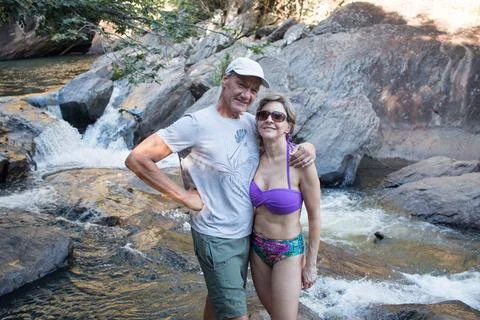 Couple at Waterfall Stock Photos