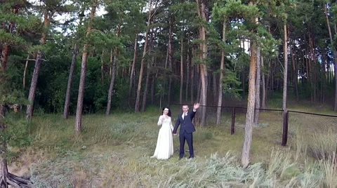 Couple waving their hands in the camera Video stock 65180451