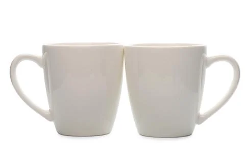 Couple white empty coffee cups is isolated on background, mockup Stock Photos