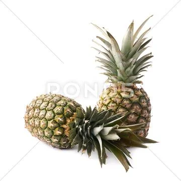 Couple of whole pineapples isolated over white background Stock Photos