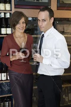 A couple wine tasting Stock Photos