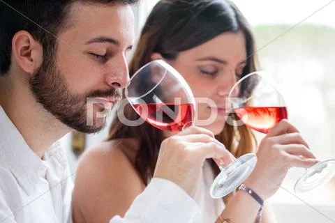 Couple at wine tasting. Stock Photos