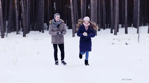 Couple Winter Snow Forest Walking Happy Smiling Man And Woman Holding Hands In Stock Footage 70989845