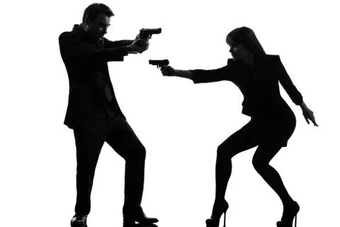 Couple woman man detective secret agent criminal  silhouette Stock Photos