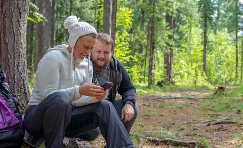 Couple in the woods. Stock Photos