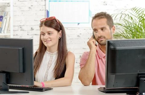 Couple at work in the office, Stock-Fotos
