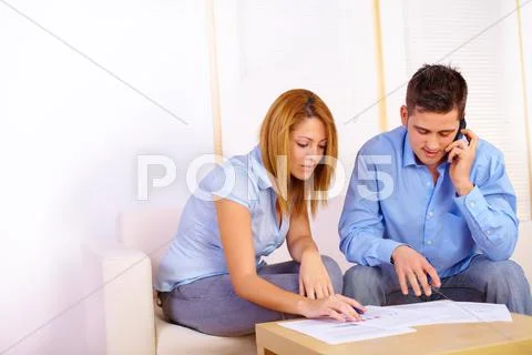 Couple working with documents Stock Photos