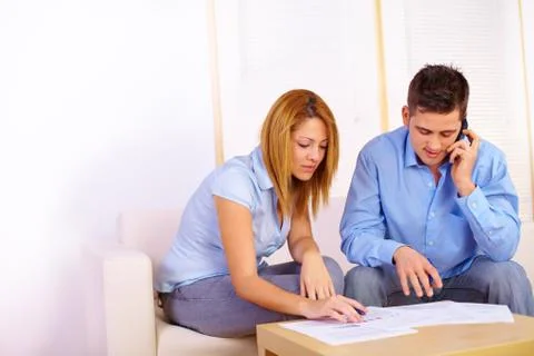 Couple working with documents Stock Photos