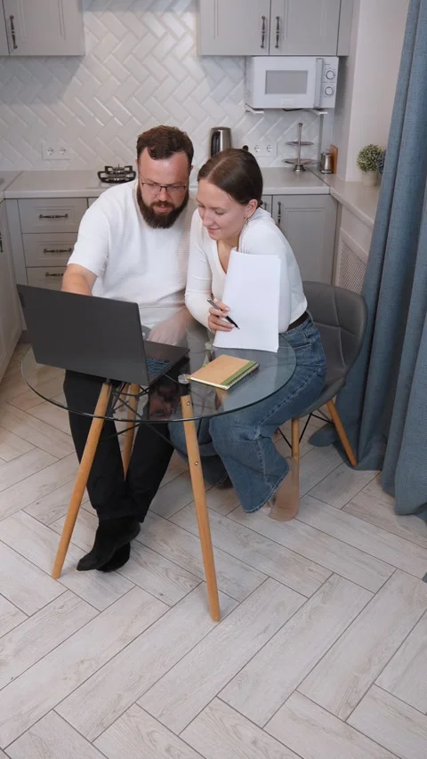 Couple working from home having a discussion Stock Footage 317444119